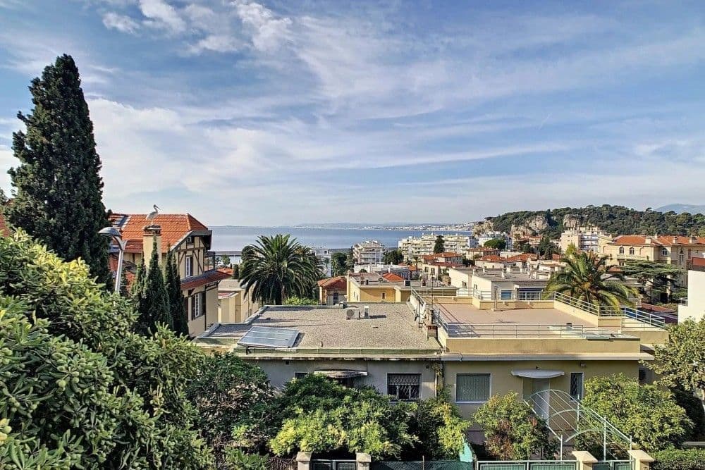 Gardens and villas on Mont Boron with the sea beyond