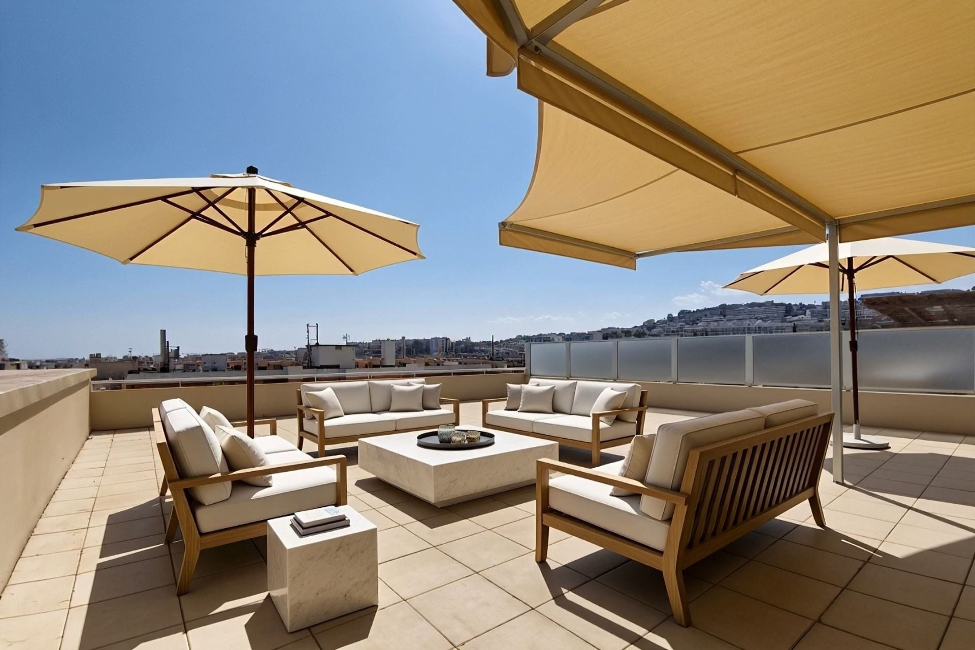 Rooftop terrace with parasols, an awning and outdoor sofas over the rooftops, 2-bedroom apartment in Nice centre, Nice